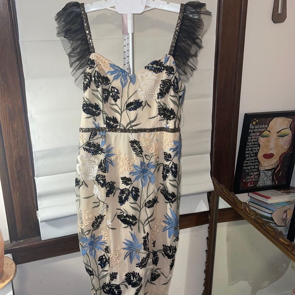 Lulus Party Dress with Beaded Stiching black blue design on a beige background